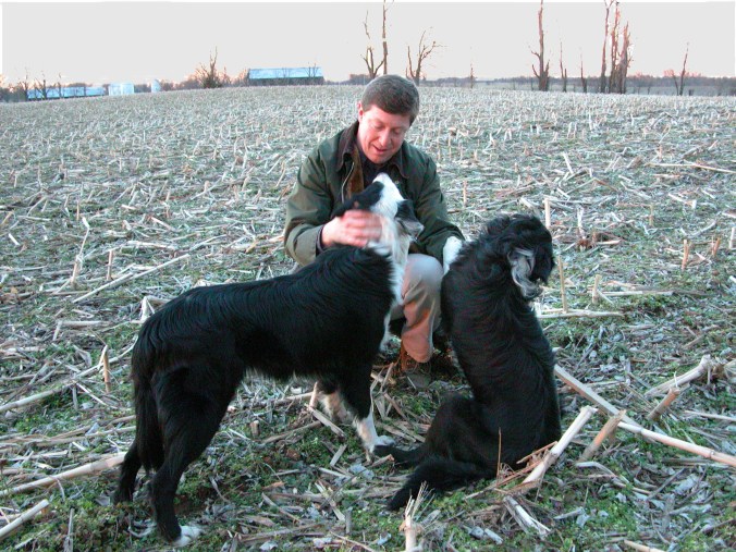 Kneeling w dogs sky fixed