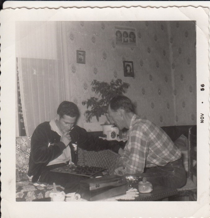 1956-dad-and-papaw-owens-playing-checkers